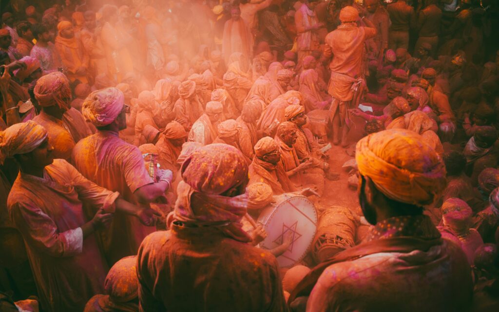 pexels-photo-13275215-13275215 Vibrant Holi celebration with people covered in colors in Barsana, India.